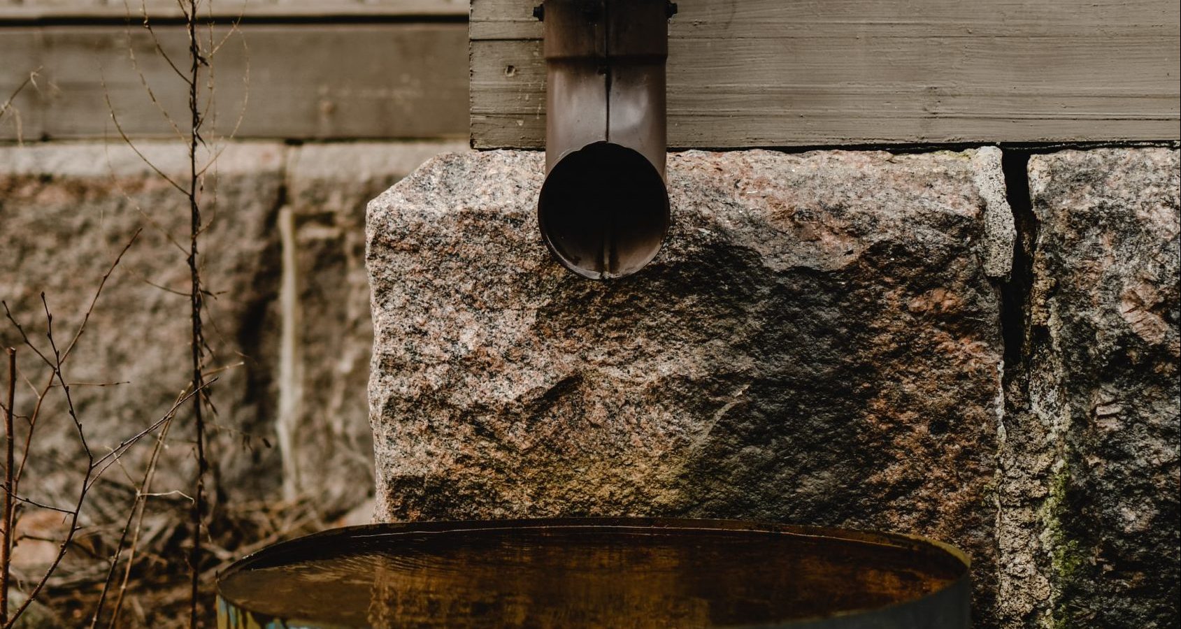 gutter downspout protecting home foundation